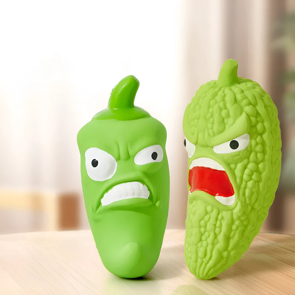 Dog chew toy in bitter gourd or chili pepper shape with sound feature for dental grinding
