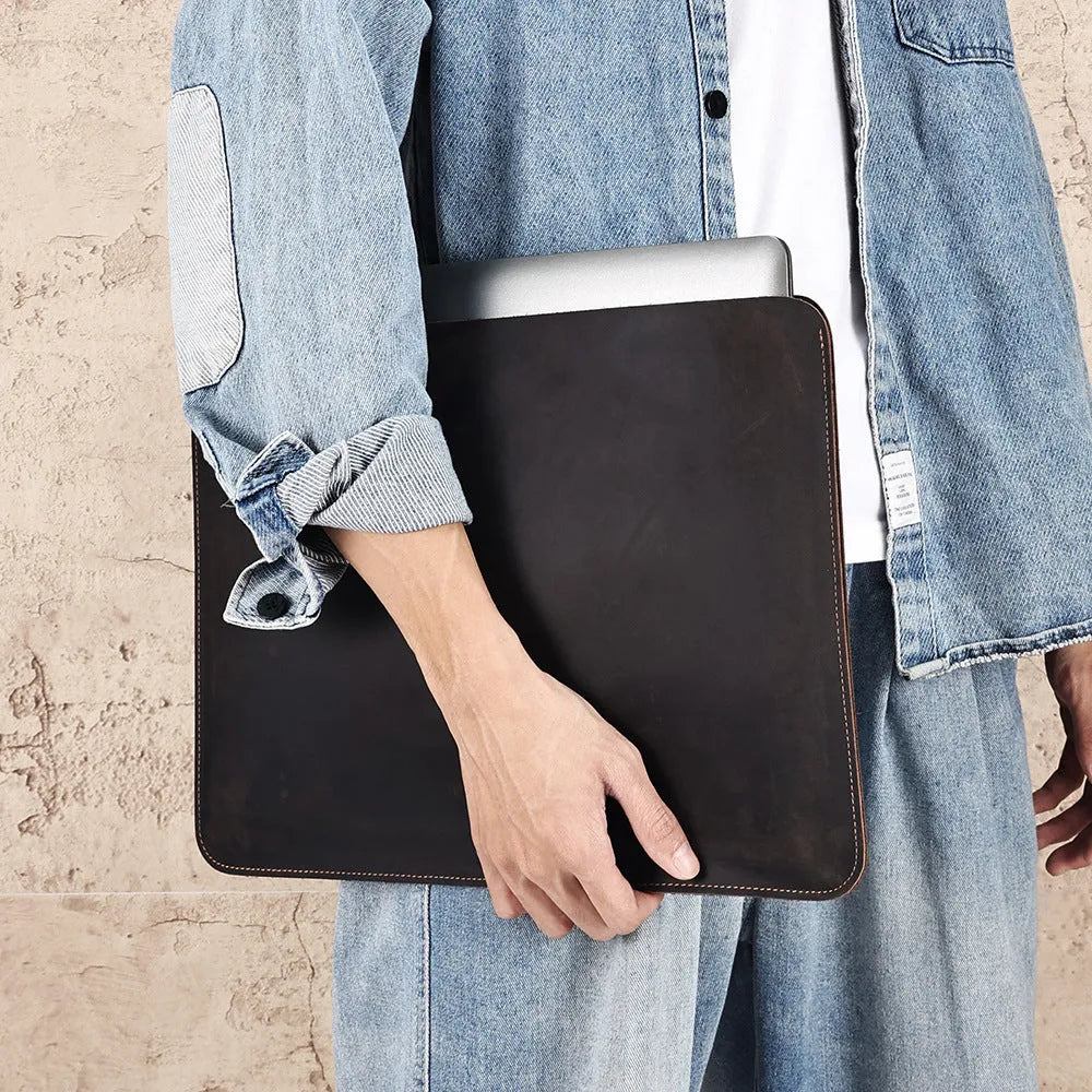 Brown genuine cowhide horizontal computer liner bag showing laptop compartment