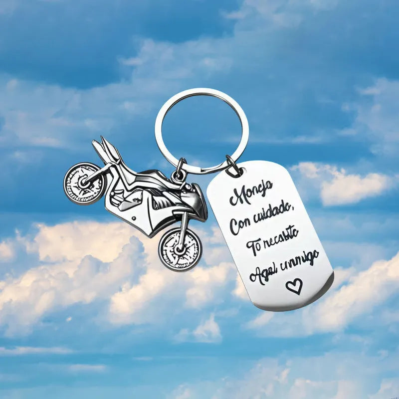 Stainless steel motorcycle keychain with velvet gift pouch in modern minimalist design
