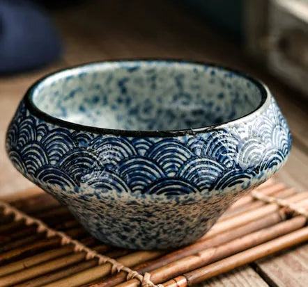 Porcelain Japanese soup bowl in stone conch shape with underglaze finish