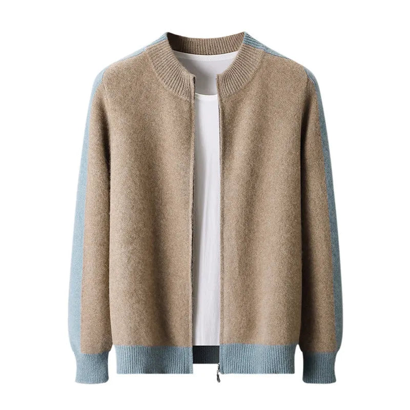 Man wearing a dark blue half turtleneck zipper cardigan made of thick rough wool yarn.
