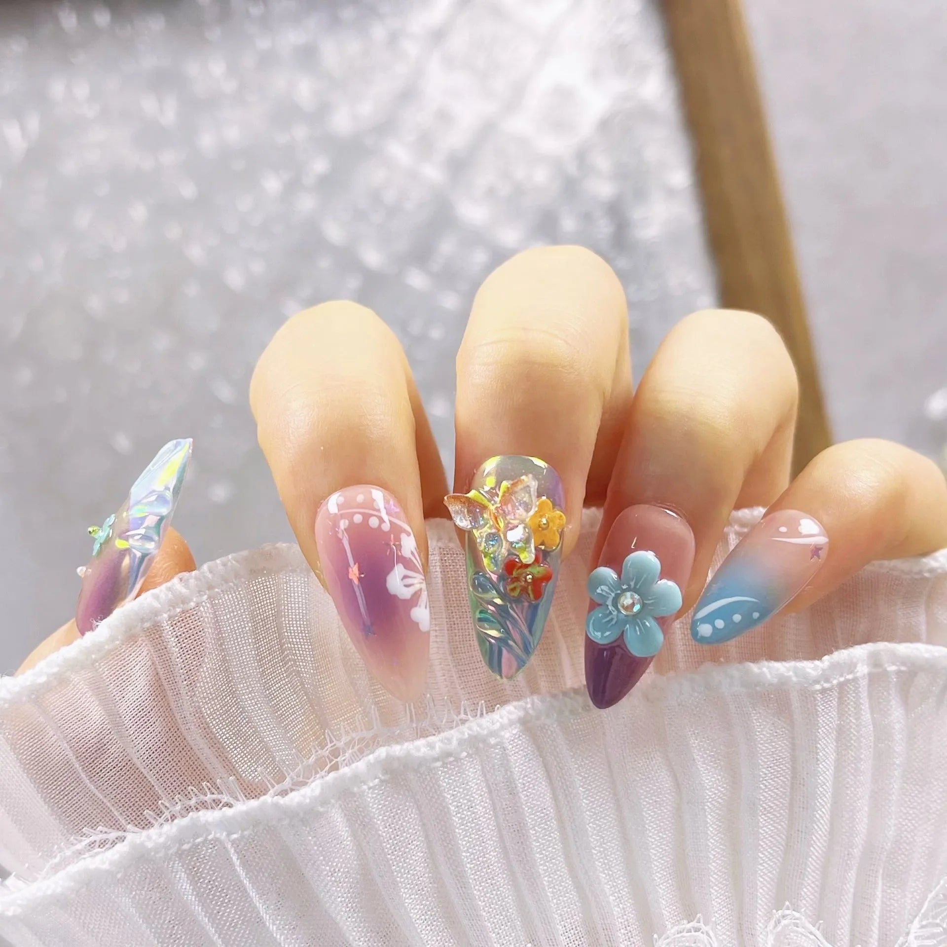 Handmade colourful sculpture manicure set with embossed flower and butterfly designs for gel nail art