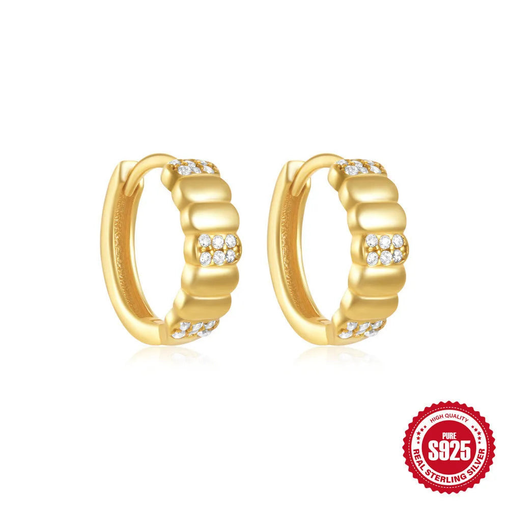 Small round geometric sterling silver stud earrings with a diamond shape, available in gold or silver finish.