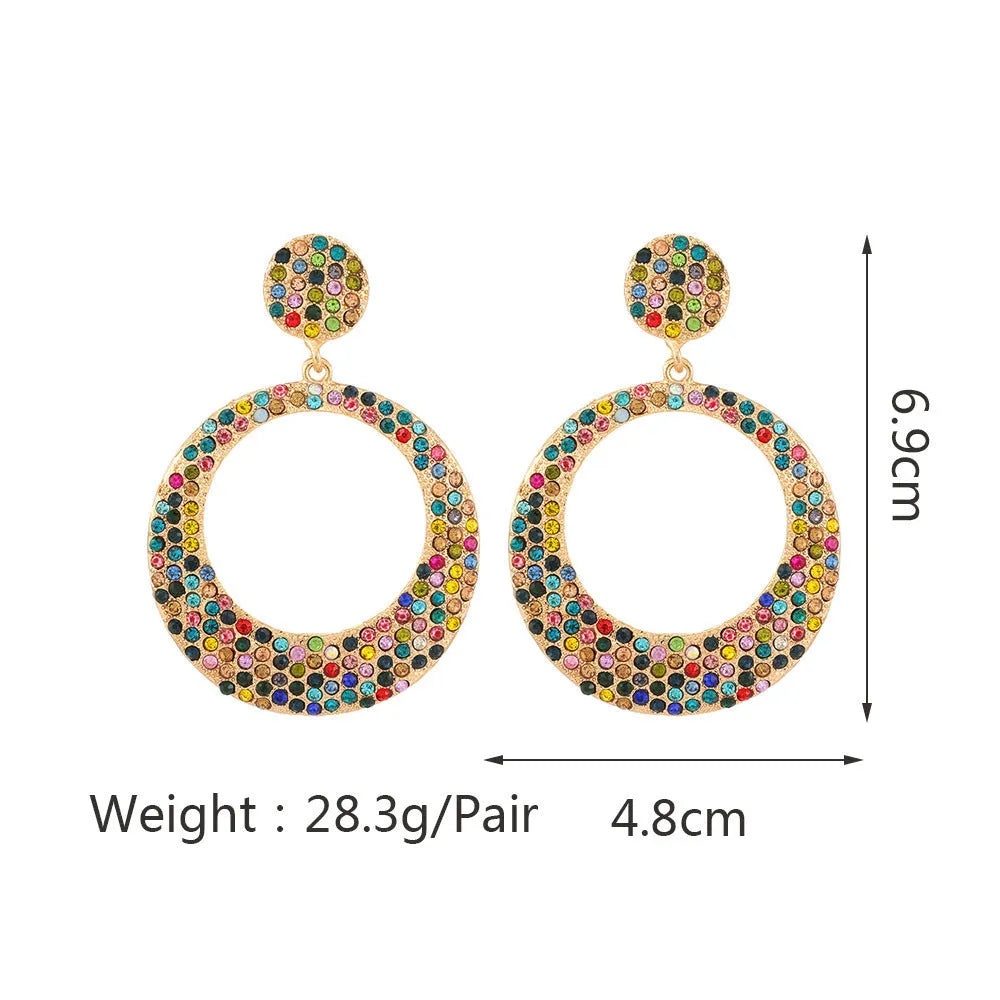 Colourful metal round pendant earrings with diamond design in cartoon style