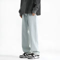 Men's light blue straight leg jeans with button waist and classic five-pocket design
