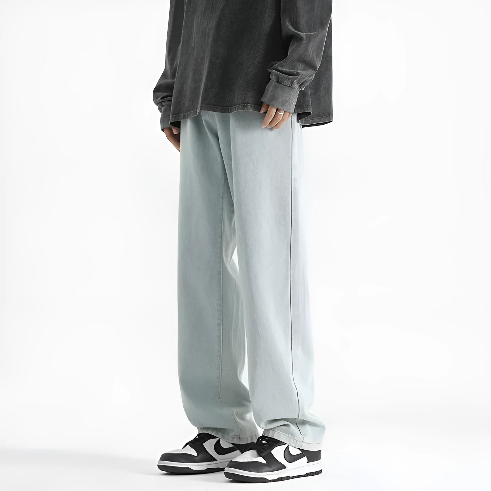 Men's light blue straight leg jeans with button waist and classic five-pocket design