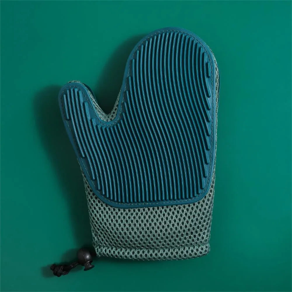 Dark blue pet hair remover glove with mesh and TPR material for grooming cats and dogs.