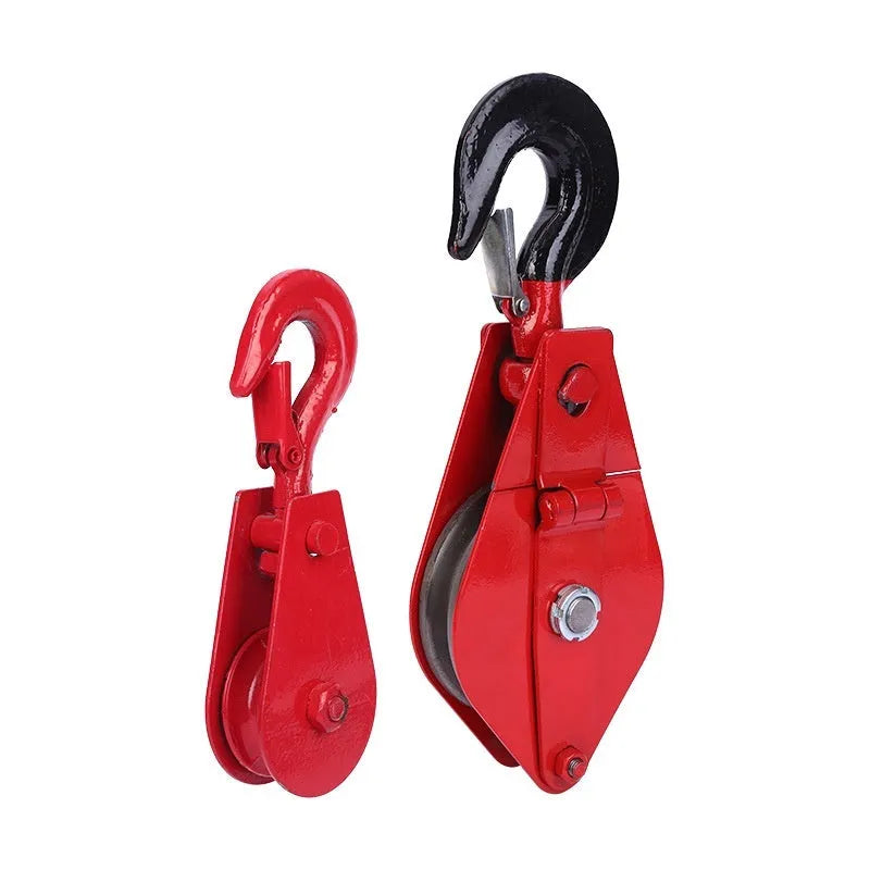Red forged steel lifting pulley with a safety latch on the hook, for industrial wire rope use.
