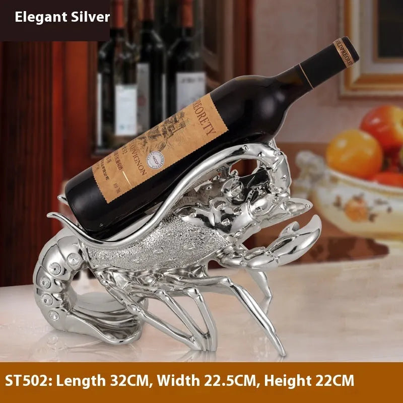 Lobster-shaped wine rack theme ornament in rose gold or silver resin and plastic finish on a shelf.