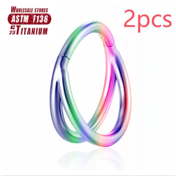 Titanium alloy fork nose ring in silver colour on a plain background, showing its shape and size.