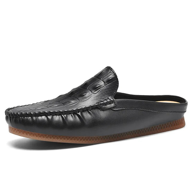Men's black leisure semi-slipper with Gommino rubber sole and breathable artificial PU upper.