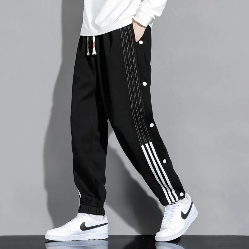 Men's loose-fit sportswear trousers with ankle tie detail in cotton blend fabric