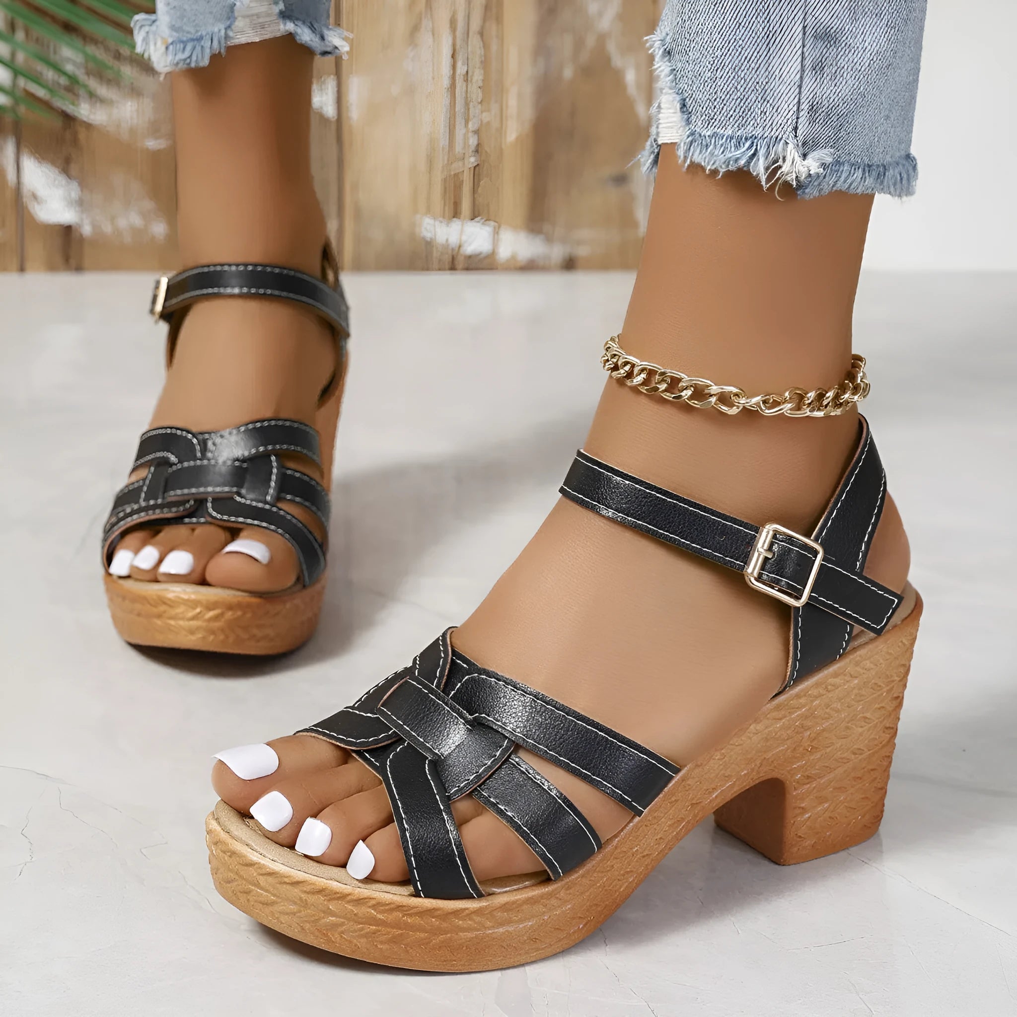 Plus size Roman women's peep toe chunky heel buckle sandals in black on white background