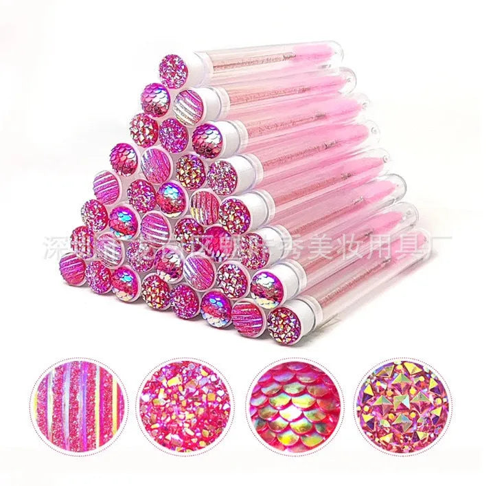 Set of coloured disposable mascara wands with clear plastic storage tubes