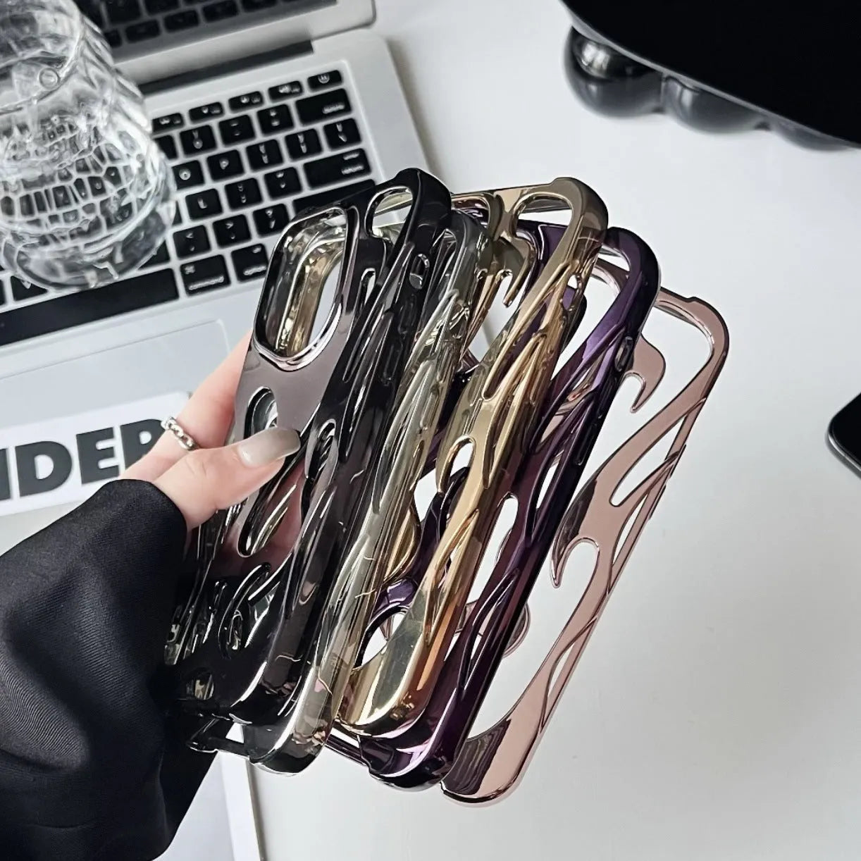 Electroplated hollow flame pattern phone case for Apple iPhone with metallic finish and heat dissipation design