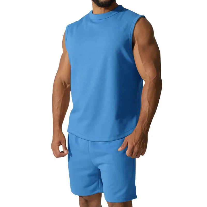 Men's sleeveless cotton blend sports top and matching shorts in a solid colour