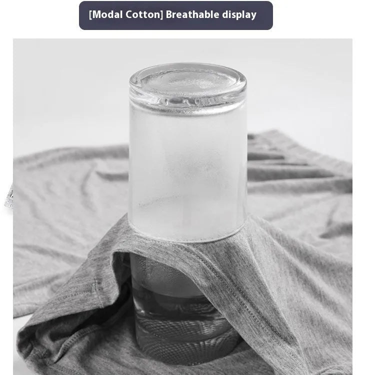 Men's solid colour high-waist boxer shorts made from modal fabric, shown in black, on a white background.