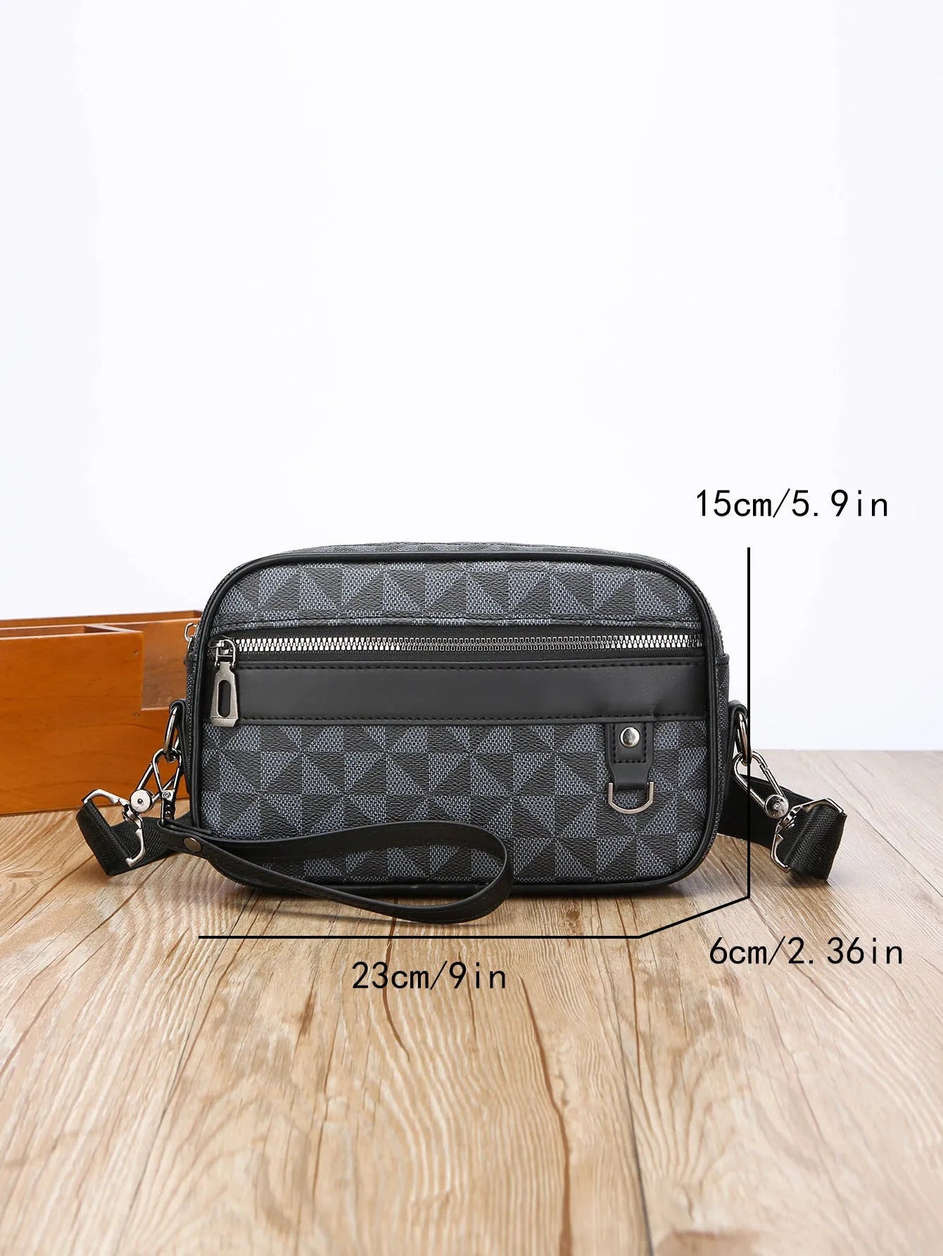 Men's geometric pattern PU messenger bag shown in a horizontal carry position.