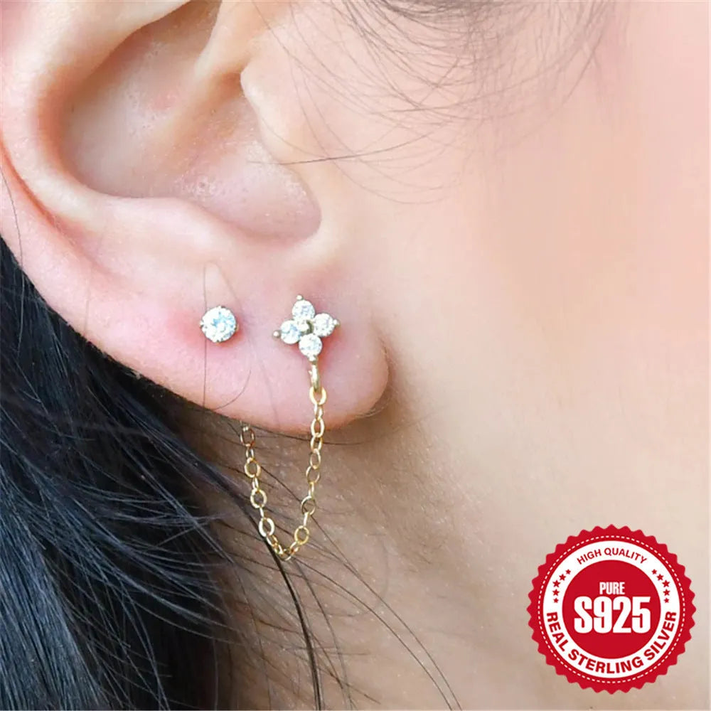 Geometric S925 sterling silver stud earring with flower, tassel, and chain design in a golden electroplated finish.