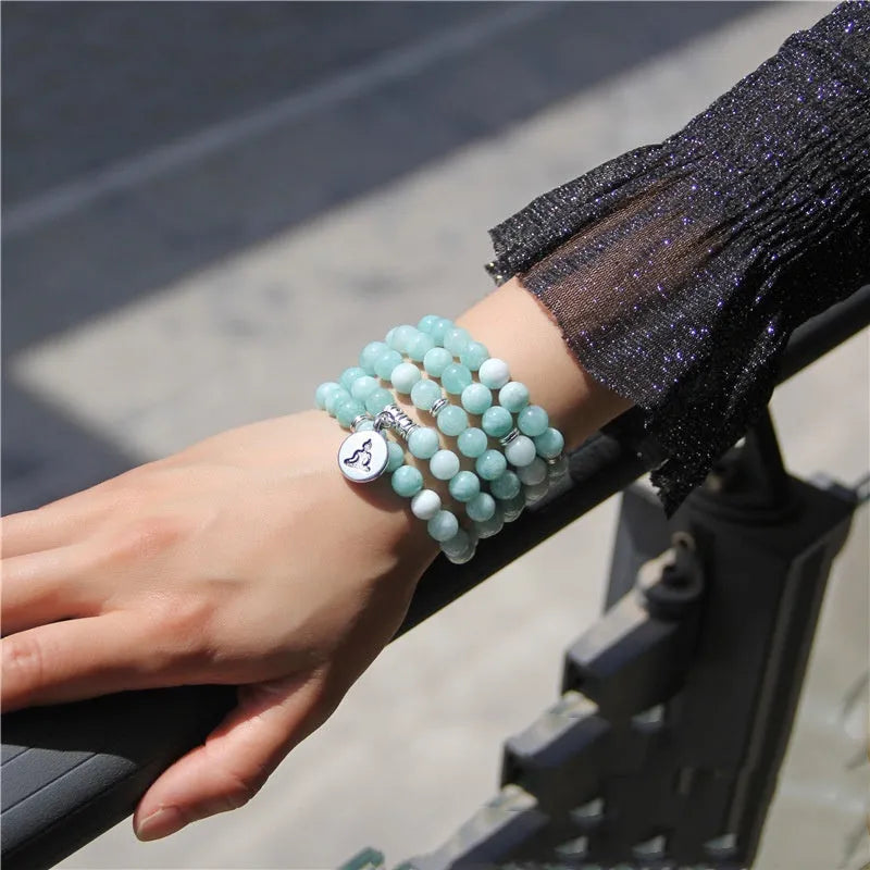 Women's vintage-style bracelet with a natural stone angel echeveria lotus pendant on a chain.