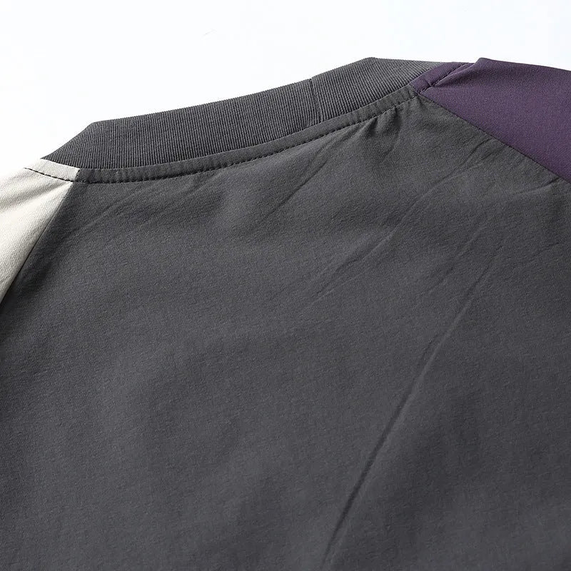 Dark grey men's loose fit t-shirt with contrast colour raglan short sleeves.