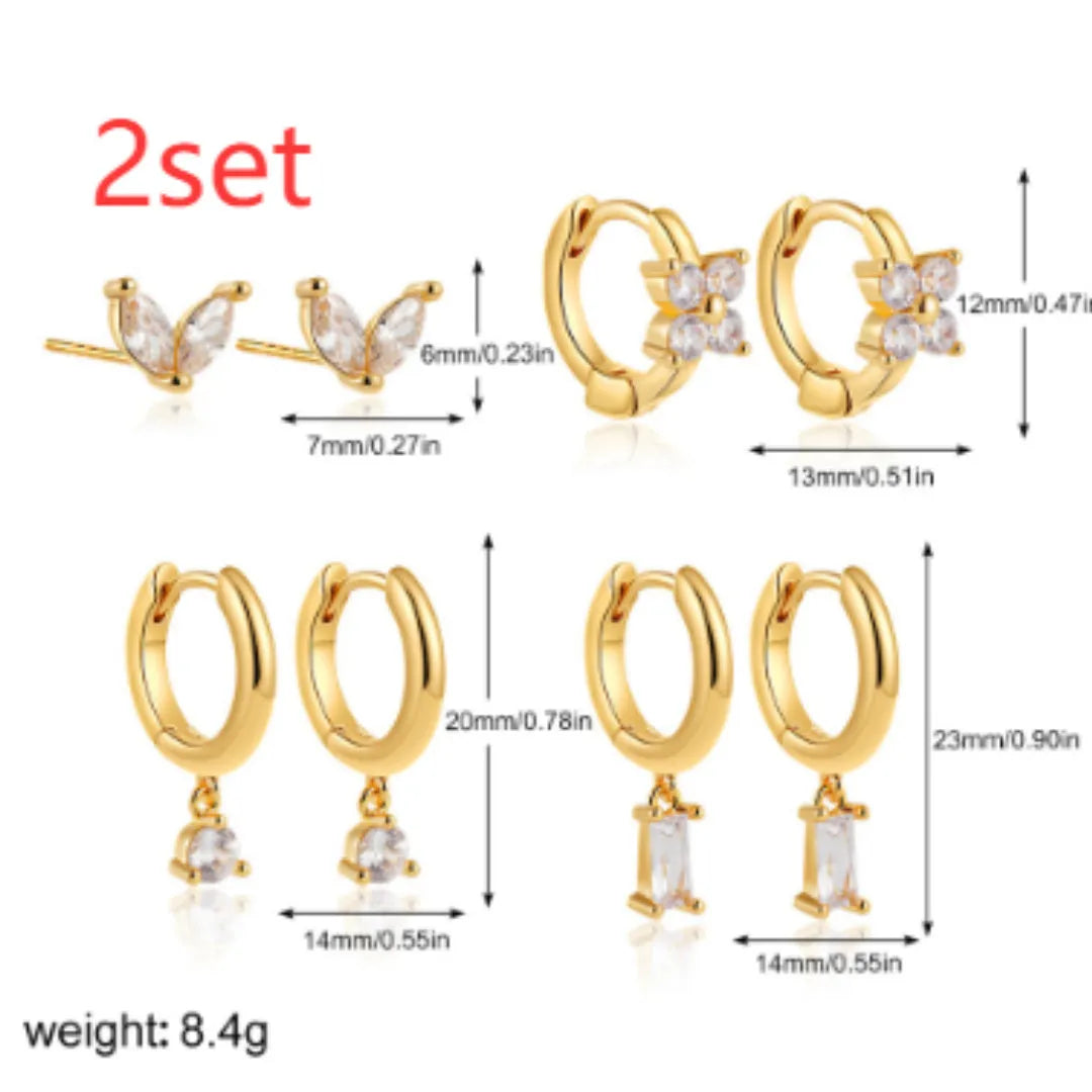 Geometric square zircon copper earrings for women in four-piece set with gold electroplated finish showing star and quadrilateral designs