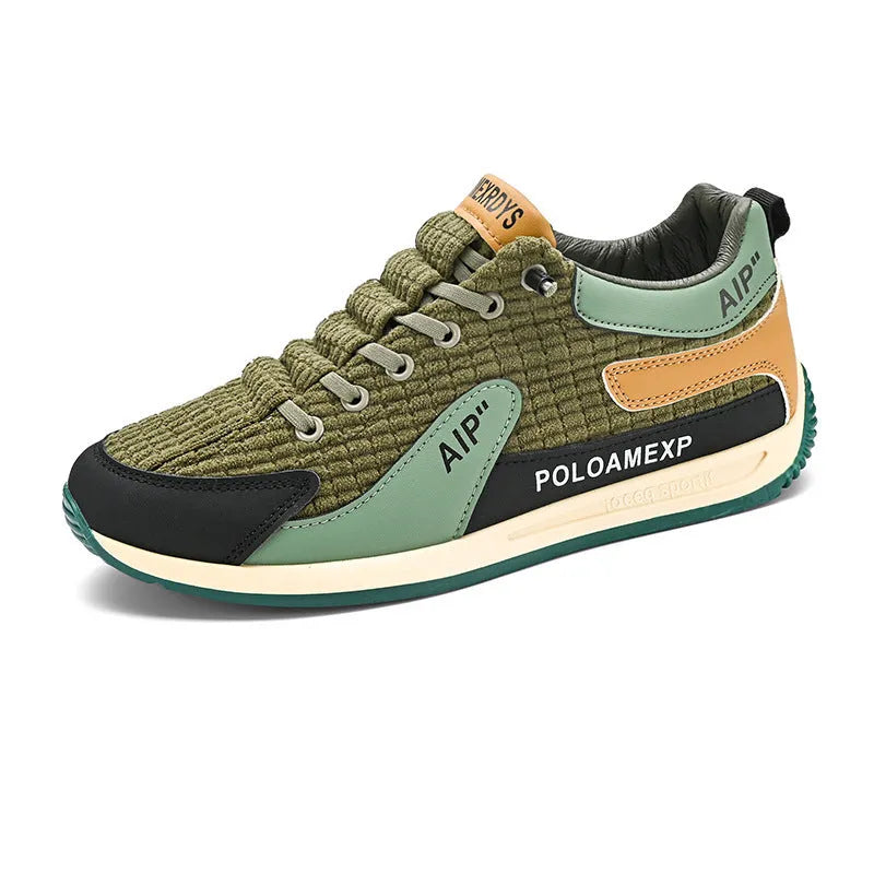 Men's grey and green mesh running shoes with round toe and lace-up design shown from side view
