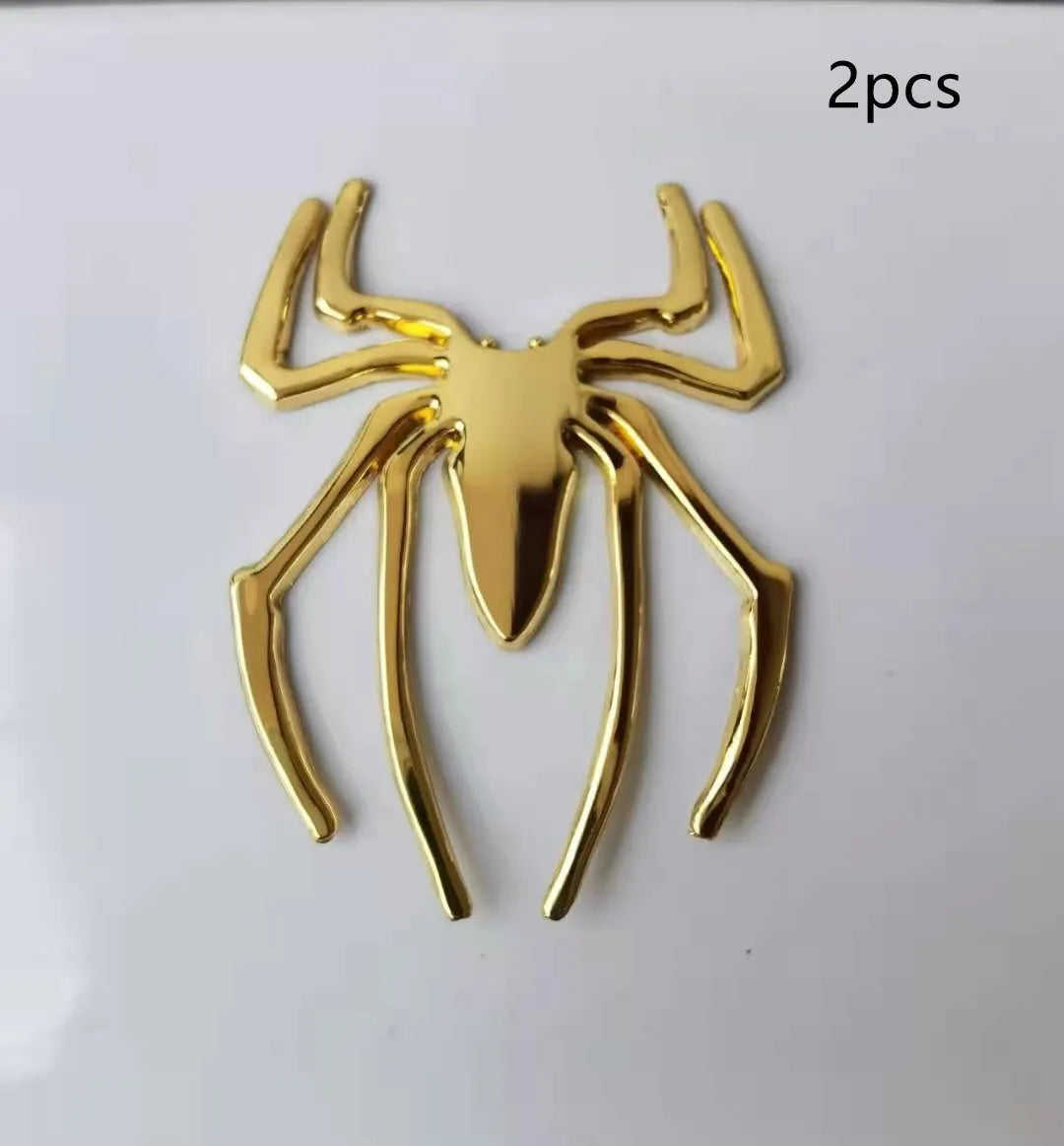 Gold zinc alloy metal spider decorative sticker on a white background