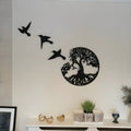 Black iron decorative wall hanging wind chime with modern simple design for garden or indoor decoration.