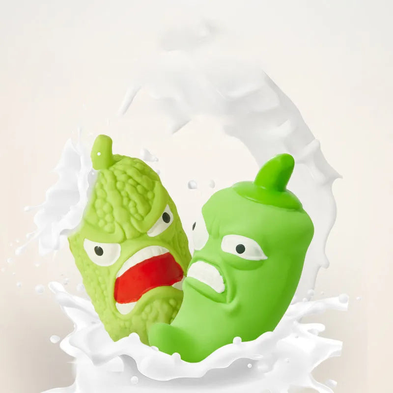 Dog chew toy in bitter gourd or chili pepper shape with sound feature for dental grinding