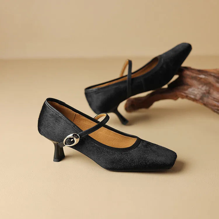 Women's black square toe stiletto heels with horse hair upper and ankle strap buckle.