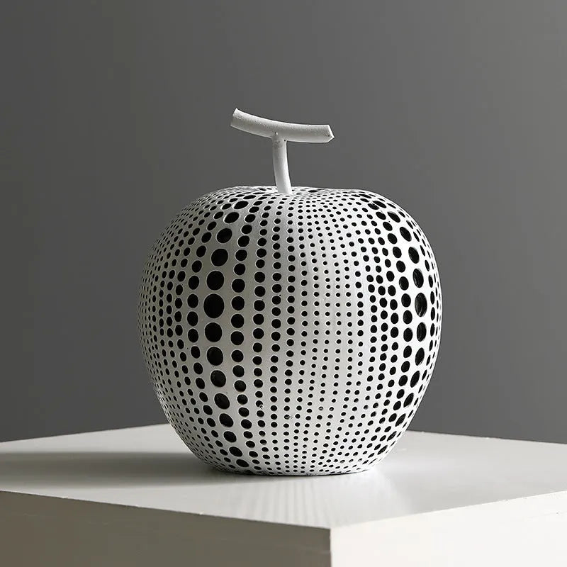 Resin decorative crafts set showing high black apple and low white pear sculptures