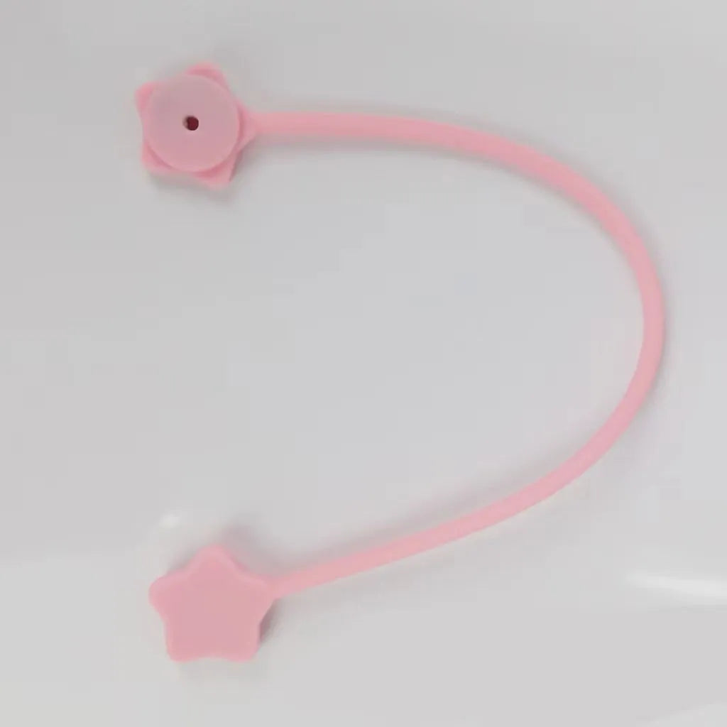 Silicone wire winder with magnet for organising cables in assorted colours on a white background.