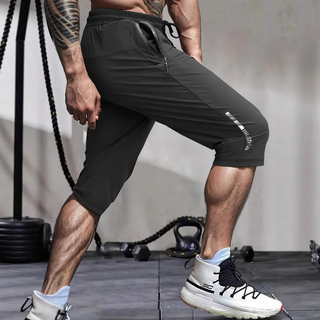 Men's cropped ice silk sports casual pants in nylon fabric with straight-leg cut