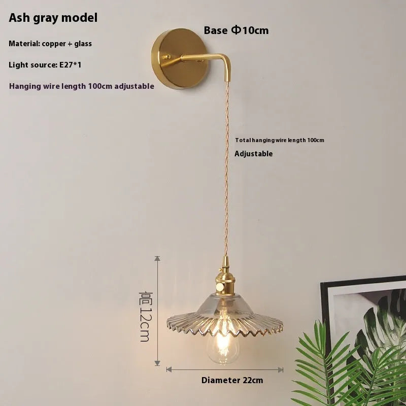Retro brass lotus wall lamp with copper body and glass shade in 22cm diameter