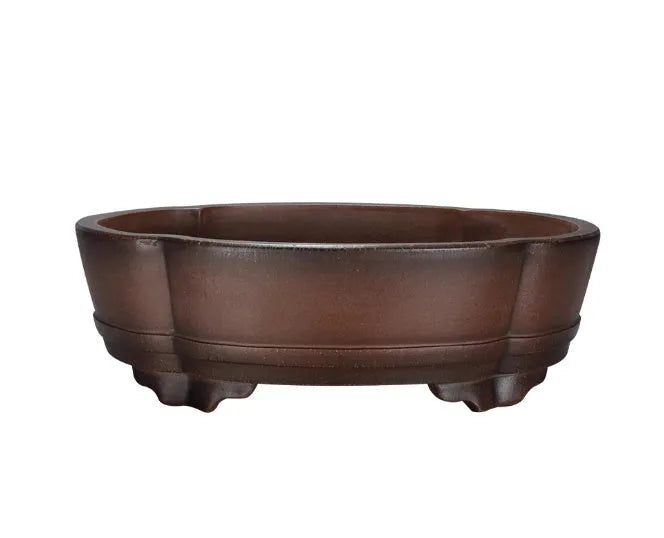 Classical purple clay ceramic bonsai pot with old pile finish, shown on a tabletop.