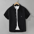 Women's loose-fitting lyocell cardigan in black, green, or purple with short sleeves