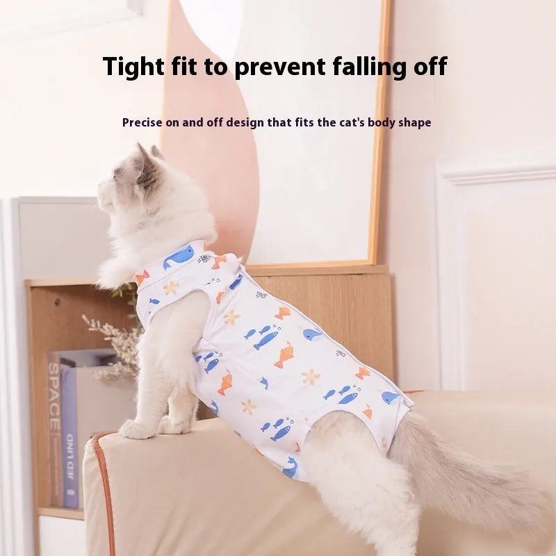 A cat wearing a blue patterned polyester sterilization recovery suit with velcro fastening on the side.