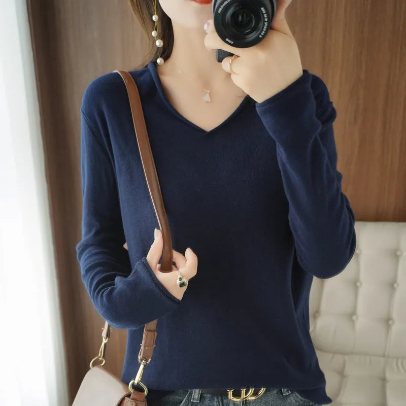 Women's long sleeve V-neck knitwear pullover top in a choice of ten colours on a hanger.