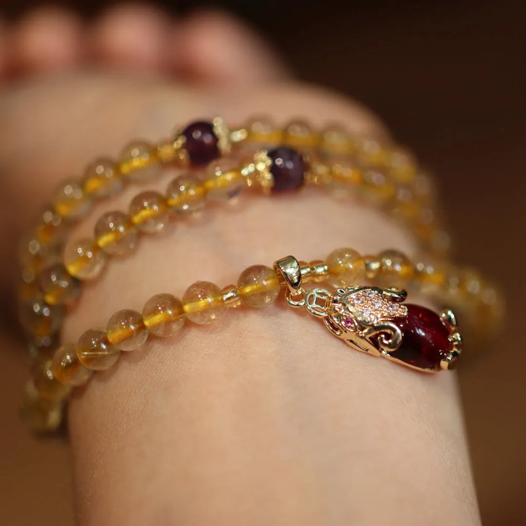 Natural Brazil gold rutilated quartz bracelet with Chinese style design and hanging chopsticks