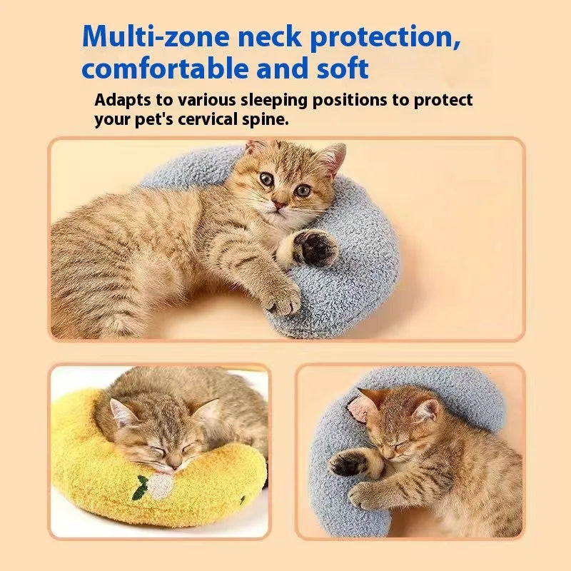 Blue moon-shaped and yellow question mark-shaped cloth pillows for cats, showing U-shaped neck support design.