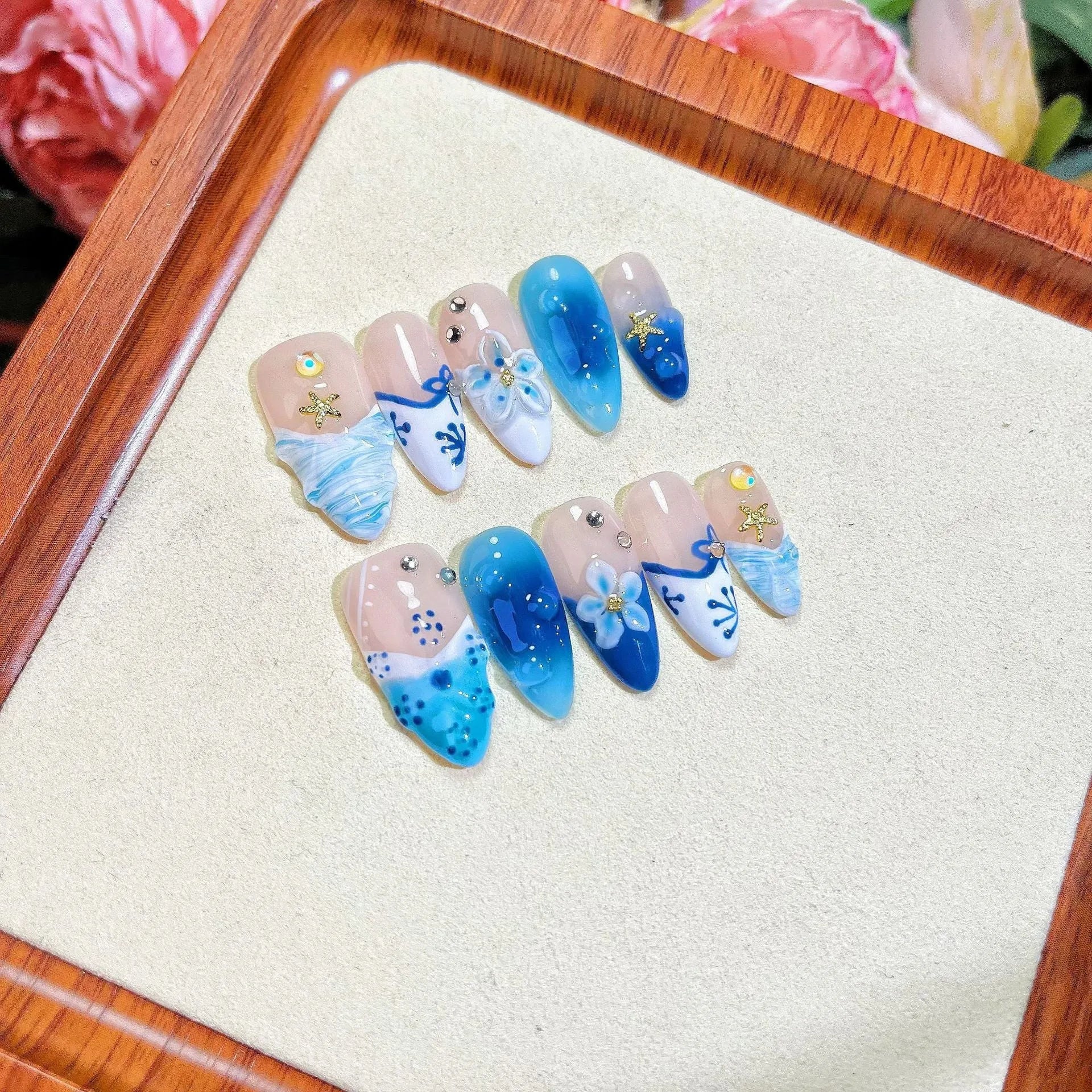 Blue hand-painted carved summer ice transparent plastic fake nails with floral design