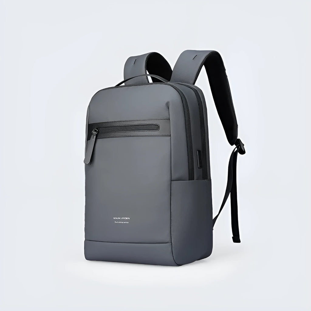 Graphite grey USB charging business backpack with Oxford cloth construction showing external USB port
