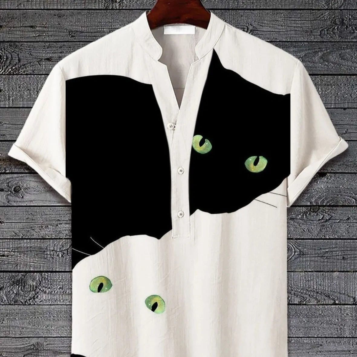 Man wearing a short sleeve shirt with a vivid 3D digital print of an animal graphic.
