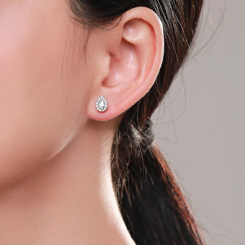 Women's sterling silver drop earrings with water drop shape and diamond treatment