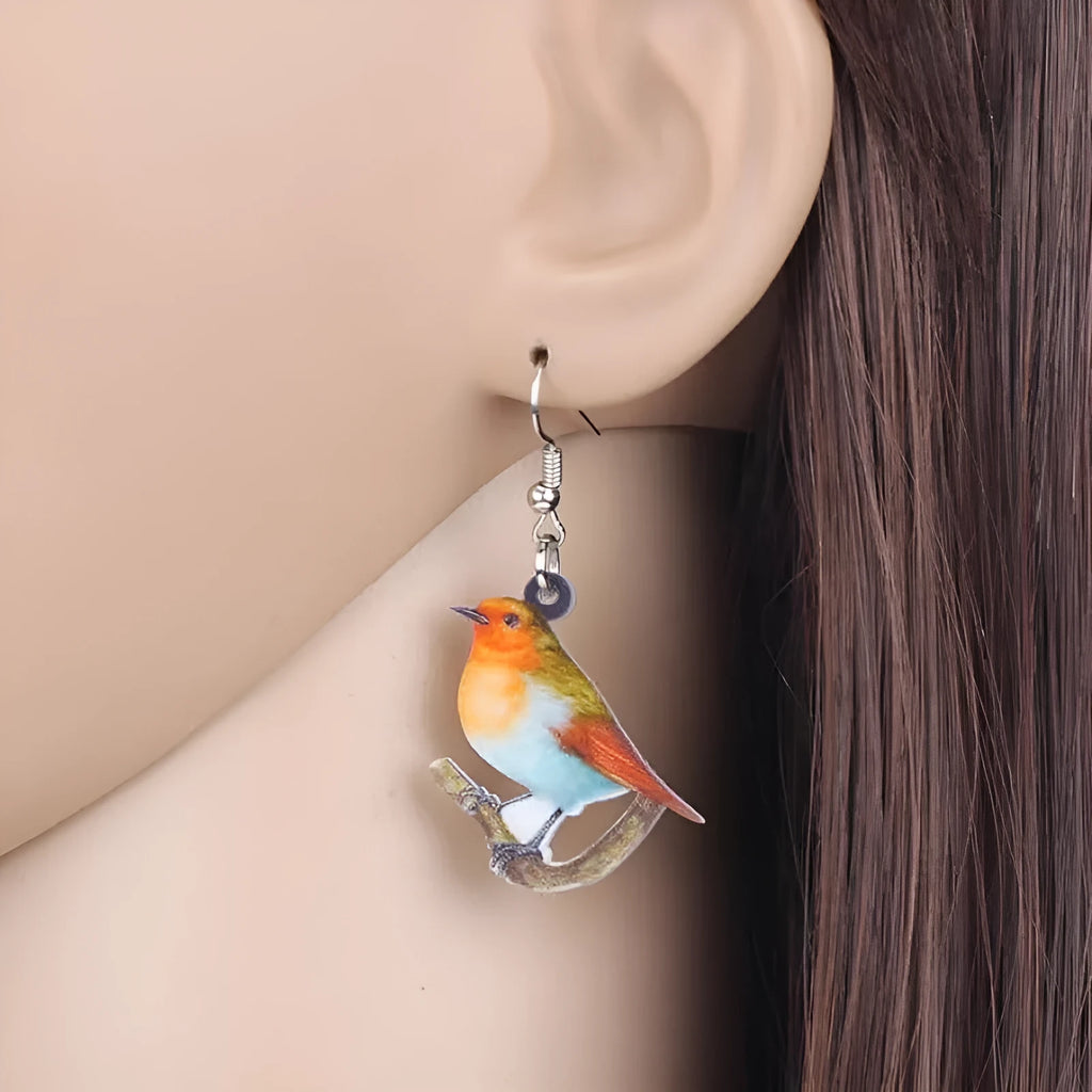 Blue titmouse bird pendant acrylic earrings with geometric drop design and snake chain links