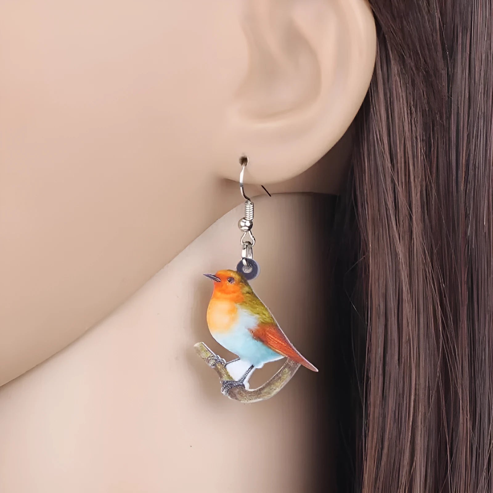 Blue titmouse bird pendant acrylic earrings with geometric drop design and snake chain links