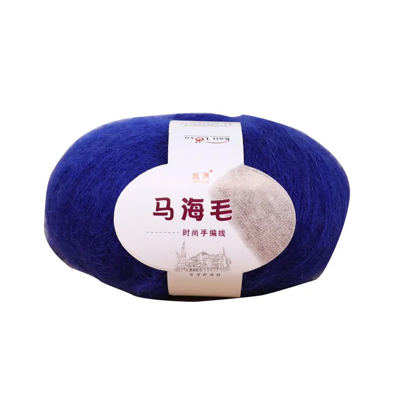 DIY mohair scarf weaving kit showing one wool ball and a selection of 34 colour options including white, pink, blue and green.