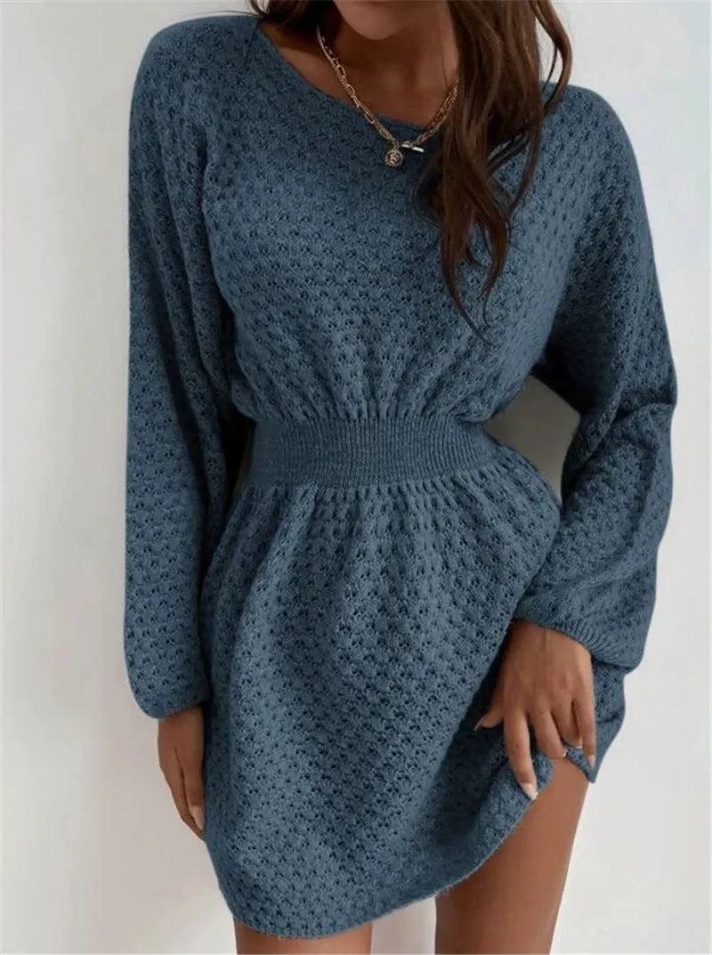 Blue slim-fit women's knitted dress with hand-crocheted flower detail on the front.