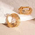Twisted geometric hollow stud earrings in silver and gold electroplated finishes